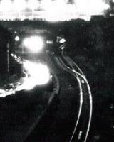 Note the distant points in this view after dark on 10/3/76. There is now double track here.<br><br>[Ken Strachan /03/1976]