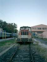 <B>SNCF 8473</B> at Ille-sur-Tet siding while trains pass in the station on the Perpignan to Villefranche-sur-Conflent line.<br><br>[Alistair MacKenzie 02/11/2007]