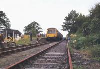 A DMU at Petrockstow, North Devon, in August 1982 with a railtour bound for Meeth. Closed to passengers in 1965 the line continued to carry freight from the Meeth quarries until 1982. [Editors note: Another railway station whose name was spelt differently (without the final 'e') from that of the village it served.] [See image 39828]<br><br>[Ian Dinmore /08/1982]