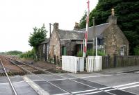 Remains of Halbeath station, Dunfermline, closed to passengers in 1930. View is west from the level crossing in June 2005 towards the sidings used for reversal by trains on the Hunterston-Longannet PS coal suppply route.<br><br>[John Furnevel 02/06/2005]