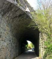 The south end of the footpath across Tavistock viaduct passes over this skew bridge after passing Tavistock South station; which is now split into holiday cottages.<br><br>[Ken Strachan 16/04/2017]