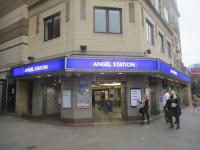 <h4><a href='/locations/A/Angel'>Angel</a></h4><p><small><a href='/companies/C/City_and_South_London_Railway'>City and South London Railway</a></small></p><p>The 1992 entrance on Islington High Street to Angel station on the Northern Line, which replaced the original City & South London Railway entrance of 1901 on City Road which still stands (<a href='/img/77/20/index.html'>77020</a>), seen here on 20th November 2021. The entire station was rebuilt at the same time with escalators replacing lifts and, as a result, Angel now has the longest escalator on the London Underground (<a href='/img/68/747/index.html'>68747</a>), superseding that at Leicester Square. 95/138</p><p>21/11/2021<br><small><a href='/contributors/David_Bosher'>David Bosher</a></small></p>