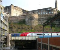 <h4><a href='/locations/E/Edinburgh_Waverley'>Edinburgh Waverley</a></h4><p><small><a href='/companies/N/North_British_Railway'>North British Railway</a></small></p><p>Trains held on New Street bridge on the eastern approach to Waverley on Sunday morning 30 April 2006. Under construction on the left is the new Edinburgh Council HQ, part of the Waverley Valley development, while on the right is the top floor of the former New Street bus depot, currently undergoing demolition as part of the same project. 7/10</p><p>30/04/2006<br><small><a href='/contributors/John_Furnevel'>John Furnevel</a></small></p>