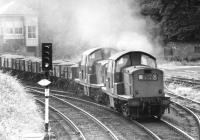 Claytons 8598+8528 passing Morningside Road signal box on the Edinburgh 'sub' in the summer of 1971 with an eastbound ballast train.<br><br>[John Furnevel 20/07/1971]