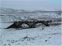 Looking south at the 2 arch viaduct about a mile from Elvanfoot in the snow.<br><br>[Ewan Crawford //]