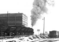 Off to the tip... a spoil train leaving a snowy Dunaskin washery on the Waterside complex in December 1971 heading for Cutler Tip. The loaded wagons on the right in the Cutler Sidings are awaiting collection by BR [see image 3579]. <br><br>[John Furnevel 01/12/1971]