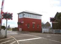 The impressive Carnoustie signal box in August 2006, looking seaward over the level crossing.<br><br>[John Furnevel 12/08/2006]