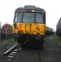 A Milngavie train - at Boness! A hybrid 303 with 303032 (A end) standing in the yard on 6 September 2006 at a rain soaked SRPS, Boness. [See image 48497]<br><br>[John Furnevel 06/09/2006]