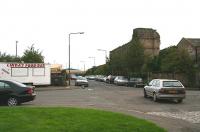 Looking east from Tower Street in September 2006 across Constitution Street towards the site of South Leith station. Opened by the E&D in 1832 as Leith, the name was changed to South Leith in 1859 with final closure to passengers taking place between 1903 - 1905. [See image 27583]<br><br>[John Furnevel 12/09/2006]