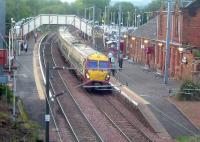 334014 at Johnstone on a service to Glasgow Central<br><br>[Graham Morgan 03/10/2006]