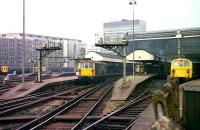 EMUs, class 73, class 33, class 08 and class 74 locomotives stand at Waterloo in March 1976.<br><br>[John McIntyre 19/03/1976]