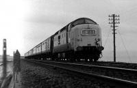Deltic 9000 near Cove with the 0900 Aberdeen - Kings Cross on 07 December 1974.<br><br>[John McIntyre 07/12/1974]