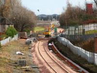 View east from Bruce Street footbridge on 5 March 2007, showing work being carried out at Hilton Road level crossing in the middle distance. Beyond that, work is also in progress on the new Parkmill Roundabout, from which the rerouted B909 road traverses the formation via a new road bridge, enabling closure of the crossing.<br><br>[John Furnevel 05/03/2007]
