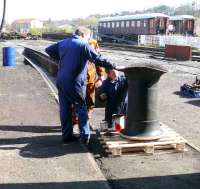 Volunteers paint the stack of No 419 after welding.<br><br>[Brian Forbes 07/04/2007]