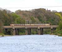 The WCML crossing the River Eden at Etterby with a train from Glasgow Central via Dumfries heading for Carlisle station. View east in April 2007.<br><br>[John Furnevel 18/04/2007]