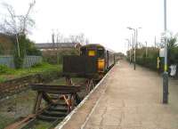 Once a through route for Liverpool - Scotland services, Ormskirk station, now a single line with 2 sets of buffer-stops, is seen on 09 January 2007. The diesel unit has just arrived on a service from Preston, while Merseyrail electric services into Liverpool depart from the other end of the platform behind the camera.  <br><br>[John McIntyre 09/01/2007]