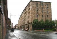 Built in the mid 1870s by the City of Glasgow Union on the site of the Old College of the University of Glasgow, the former College Goods warehouse still stands as housing on Bell Street. View west towards High Street, May 2007.<br><br>[John Furnevel 06/05/2007]