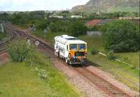 Track maintenance unit takes the sub at Niddrie West Junction on 25 May and heads along the single line section to Portobello.<br><br>[John Furnevel 25/05/2007]