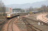 Trains passing at Stirling North in April 2007. Buffer stops guard the Alloa lines on the right which would see passenger services commence just over a year later.<br><br>[John Furnevel 16/04/2007]