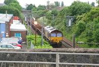 A Sunday morning PW train heads towards Glasgow after passing through Milliken Park station on 17 June 2007. EWS 66016 brings up the rear of the train. <br><br>[John Furnevel 17/06/2007]