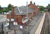 The station building at Johnstone, Renfrewshire, on a Sunday morning in June 2007. View is north east towards Paisley and Glasgow Central.<br><br>[John Furnevel 17/06/2007]