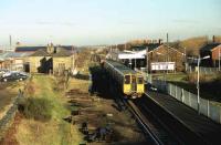 View north over Ormskirk station in 1991 with a Liverpool emu service standing at the platform.<br><br>[John McIntyre //1991]