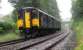 Clitheroe train near Wilpshire on the Blackburn - Hellifield line on 30 June in heavy rain.<br><br>[John McIntyre 30/06/2007]