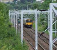 318262 about to pass through Cartsdyke with a fast train bound for Gourock.<br><br>[Graham Morgan 04/08/2007]