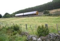 The early morning train from Wick/Thurso bound for Inverness on 30 August 2007, seen here running along the southern slopes of Strathfleet shortly after leaving Rogart.<br><br>[John Furnevel 30/08/2007]