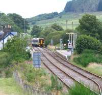 A southbound train for Inverness  is routed into the up platform at Rogart in August 2007.<br><br>[John Furnevel 25/08/2007]