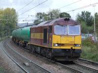 60029 <I>Clitheroe Castle</I> passing through Johnstone with fuel tanks from Prestwick to Grangemouth<br><br>[Graham Morgan 18/10/2007]