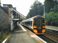 158 720 stands at Dunkeld in July 1998 with an Edinburgh - Inverness service. <br><br>[David Panton /07/1998]