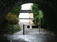 Arriving at the north portal of St Leonards tunnel (320m) on 2 January 2008, just short of the site of the former Edinburgh & Dalkeith Railway terminus at St Leonards. The majority of the site is now occupied by houses and flats, although one notable restored goods shed remains. Running above the tunnel mouth is Holyrood Park Road and directly ahead is now East Parkside. [See image 40388]<br><br>[John Furnevel 02/01/2008]