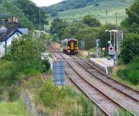 Afternoon service on the far north line pulls into Rogart on 25 August 2007 on its journey to Inverness. <br><br>[John Furnevel 25/08/2007]