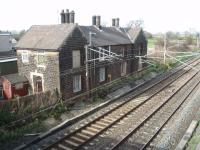 Barton and Broughton station closed in 1939 but the station building survived as a pair of houses next to the down WCML until finally demolished in the summer of 2013. Pictured from the overbridge looking north in March 2008. [See image 44079] (SD 515364)<br><br>[Mark Bartlett 01/03/2008]