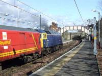 47848 passing through Johnstone station with a Royal Mail Class 325 in tow whilst on a driver training run from Ayr to Shieldmuir<br><br>[Graham Morgan 16/03/2008]