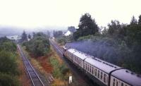 An Oban - Glasgow Queen Street service approaching Crianlarich in 1987 with the former route to Callander running off to the left and passing below the Fort William line. <br><br>[Ian Dinmore //1987]