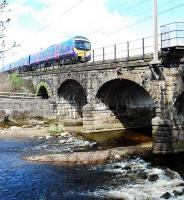Northbound First service crossing the Six Arch Viaduct (or Wyre Bridge on an OS map!) at Scorton.<br><br>[Ewan Crawford 14/04/2008]