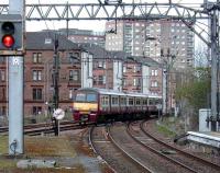 A class 320 at Dalmuir approaching platform 2 (and therefore running <I>via Singer</I>) on 19 April 2008.<br><br>[David Panton 19/04/2008]
