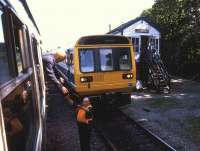 Token exchange between class 108 and class 142 crossing services at Llanrwst on the Blaenau Ffestiniog branch in July 1986.<br><br>[Ian Dinmore 12/07/1986]
