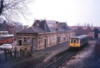 The old station at Stourbridge Town in 1977 with the railcar about to leave for Stourbridge Junction. The station closed 2 years later in its centenary year to be replaced by a new station a short distance to the southeast. This second station lasted a mere 15 years, being replaced by the current Stourbridge Town station in 1994.<br><br>[Ian Dinmore //1977]
