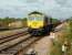 66592 brings a freight through Pilning station on the eastern side of the Severn Tunnel in August 2007.<br><br>[Peter Todd 17/08/2007]