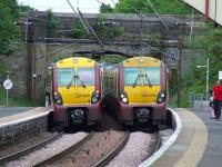 334030 and 334040 pass each other at Johnstone station on 19th May<br><br>[Graham Morgan 19/05/2008]