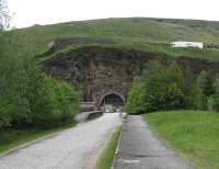 View east along the platforms towards Sheffield and the 1954 tunnel at the former Woodhead station on 24 May. The lorry is heading for Manchester on the winding A628 road.<br><br>[John McIntyre 24/05/2008]