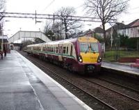 334 001 with a Dalmuir train at Scotstounhill on 23 February 2008.<br><br>[David Panton 23/02/2008]