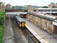 Platform 5 at Lancaster Castle is a through road alongside the up line but most services, like 156470 here, arrive from and then depart to the north either for Morecambe or, as in this case, Barrow-in-Furness. View south towards Preston.<br><br>[Mark Bartlett 14/07/2008]