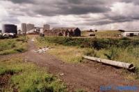 The site of the former Shotts Ironworks was to the left. The view looks north along the former trackbed of the railway.<br><br>[Ewan Crawford //]