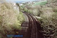 Looking south at Pinwherry. The loop line (new looking ballast to left) was lifted in the 1980s. The building was the station building.<br><br>[Ewan Crawford //]