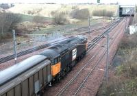 A <I>Loadhaul</I> liveried class 56 about to leave the north end of Millerhill yard with a freight on a cold and frosty December morning in 2002.<br><br>[John Furnevel 31/12/2002]