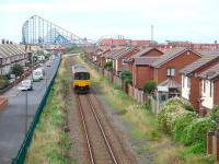 150133 leaves Squires Gate and heads towards that distinctive skyline on a service for Blackpool South on 13 August. This view shows how the modern housing development has encroached towards what was once a busy mainline. <br><br>[Mark Bartlett 13/08/2008]